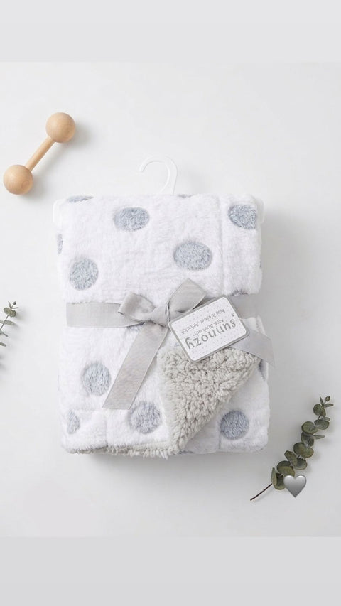 Dotted plush blankets
