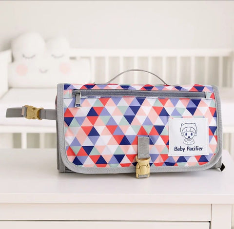 Diaper changing clutch