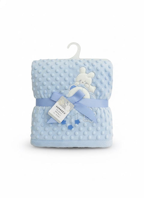 Blue dotted quilted blanket