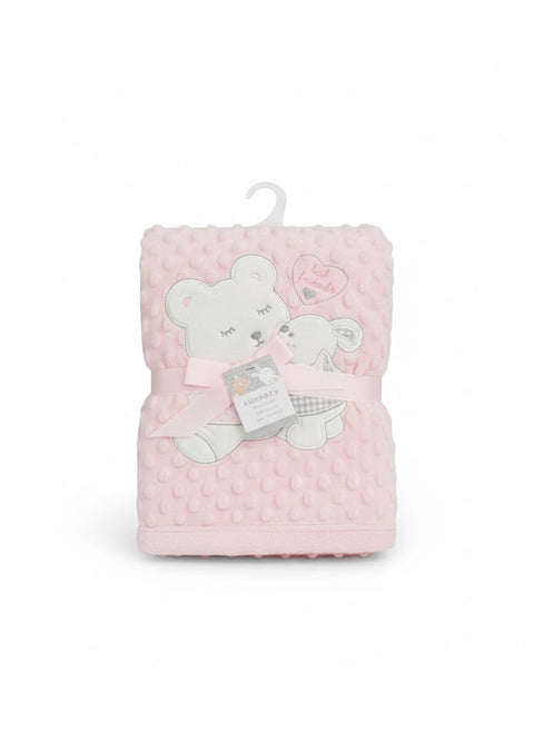 Pink dotted quilted blanket